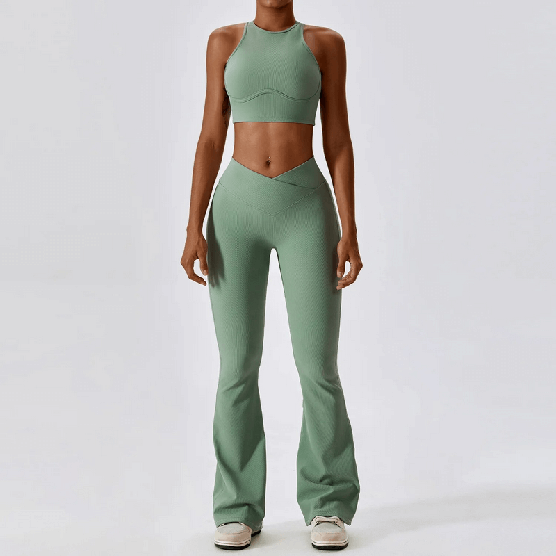 Women's push-up sports bra and ribbed cross leggings set in green for an active lifestyle